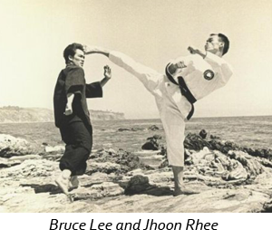 Bruce Lee and Jhoon Rhee practicing martial arts