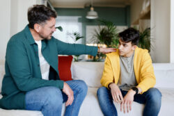 Father and son talking about the importance of learning to persevere